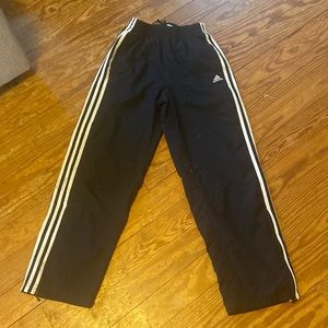 Kid Essentials Blue Adidas water/wind resistant track pants.